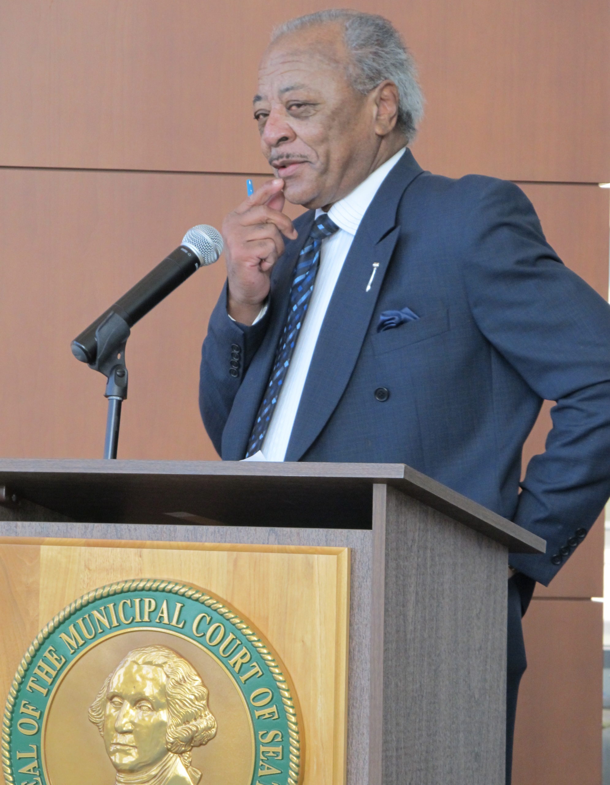 Judge Bonner speaking at a podium