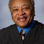 Headshot of Judge Bonner, smiling in a judicial robe
