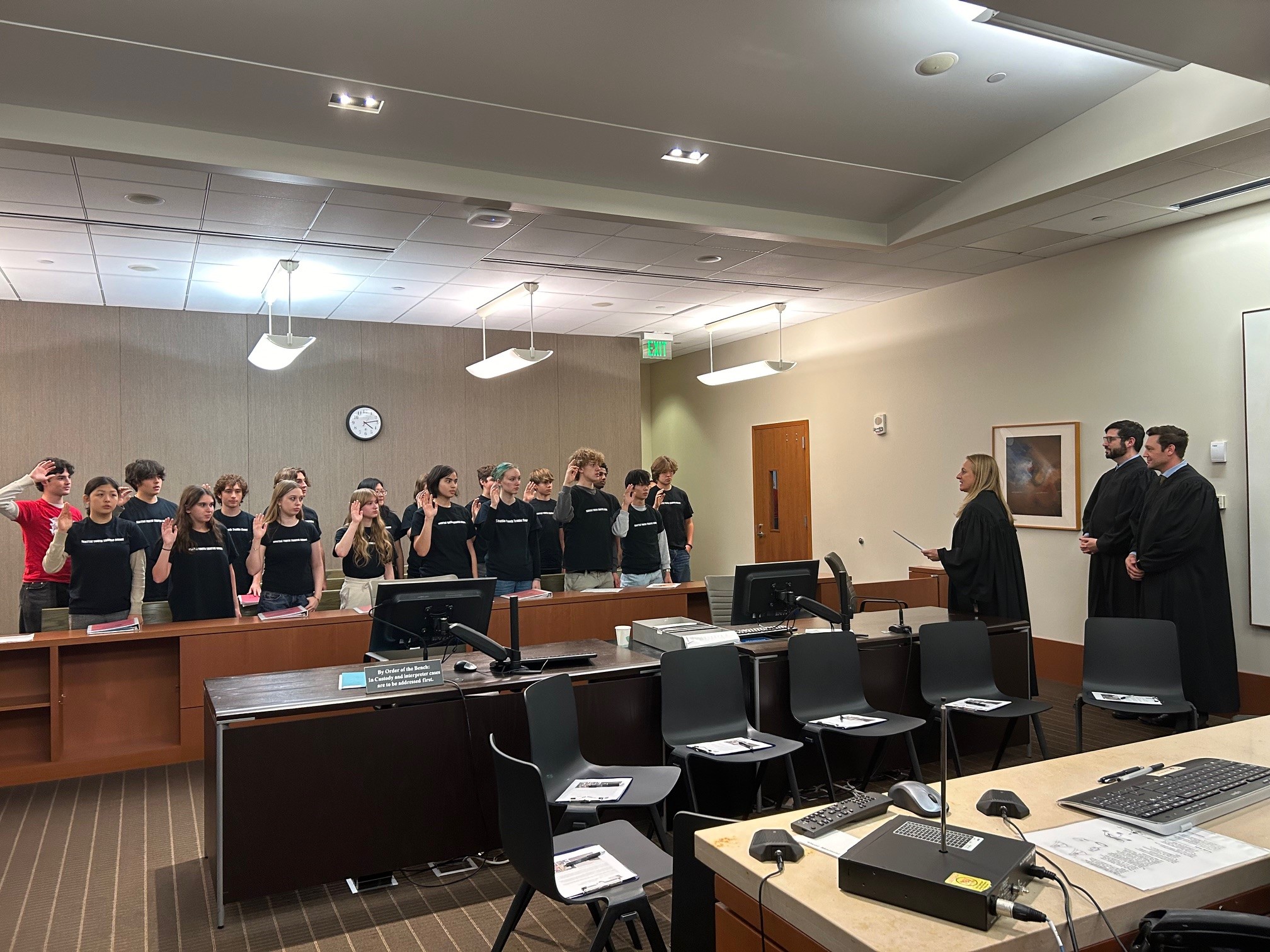 Garfield High School students get sworn into their official duties at youth court.