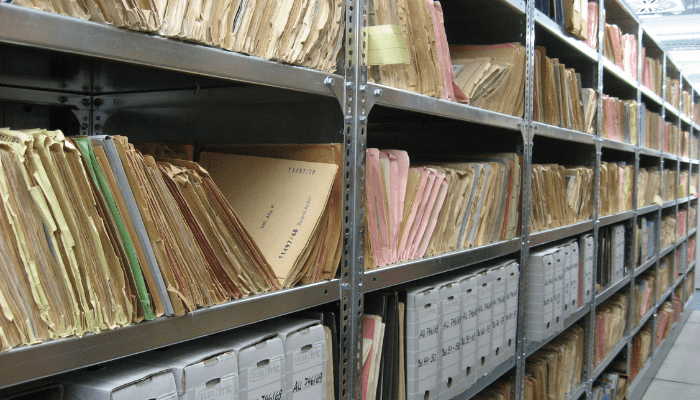 This image shows stacks of paper files.